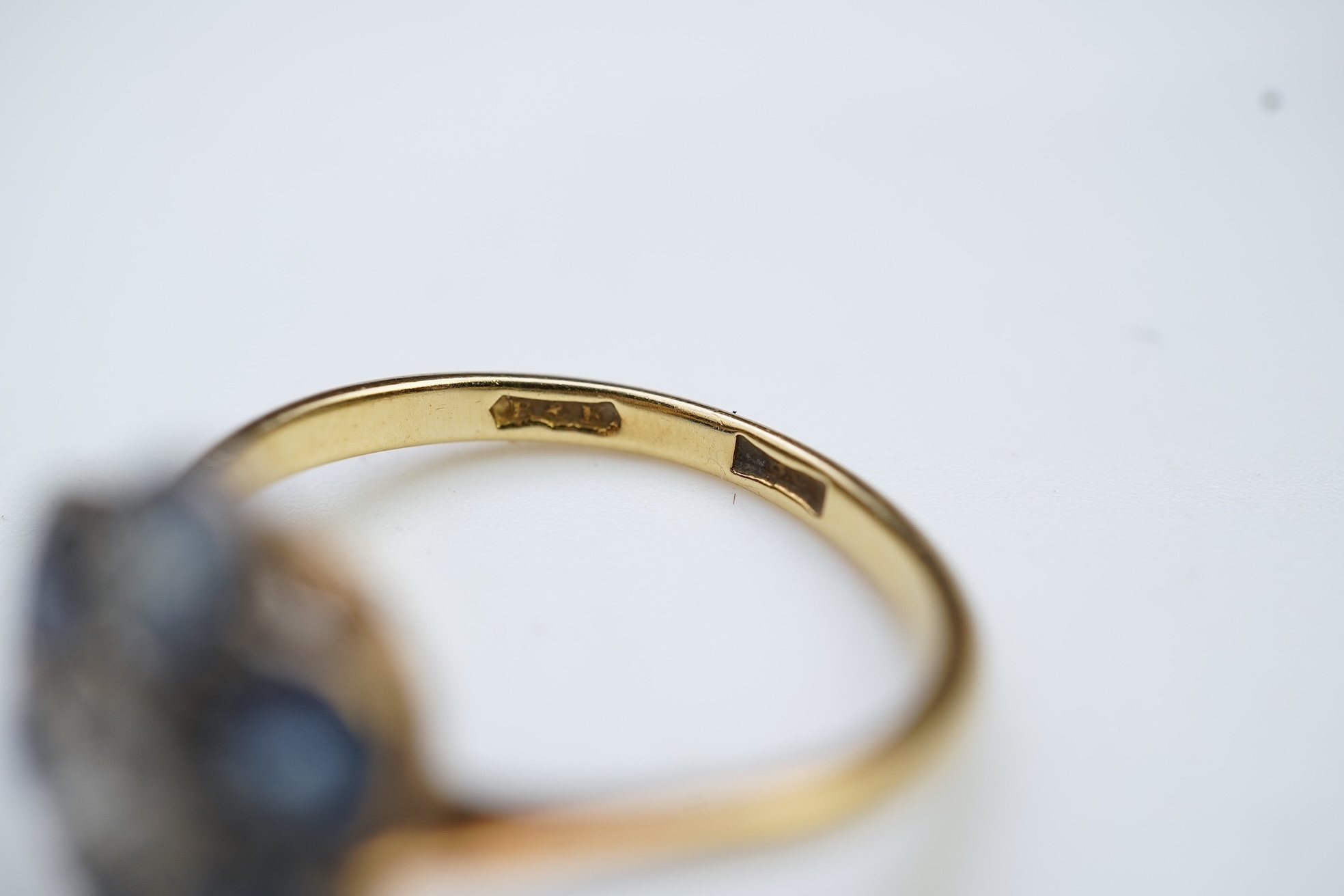 A sapphire and diamond cluster ring, early 20th century